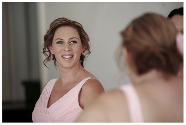 Bridesmaids in pink pleated dress get ready for a wedding at Gracehill Vineyard Estate.
