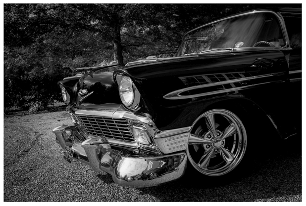 Black and white photo of classic American wedding car.